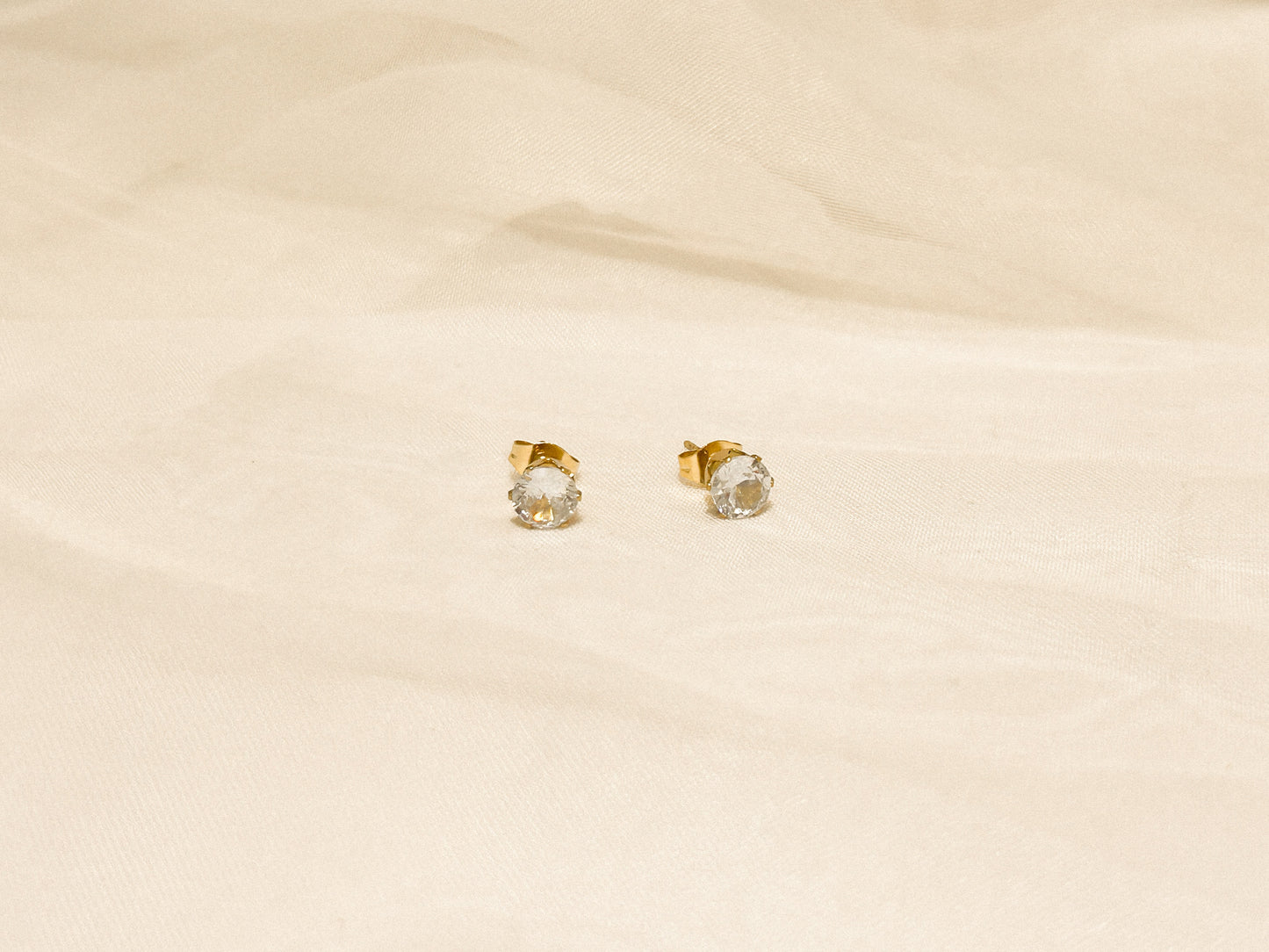 Brinco Ponto de Luz Zircônia G