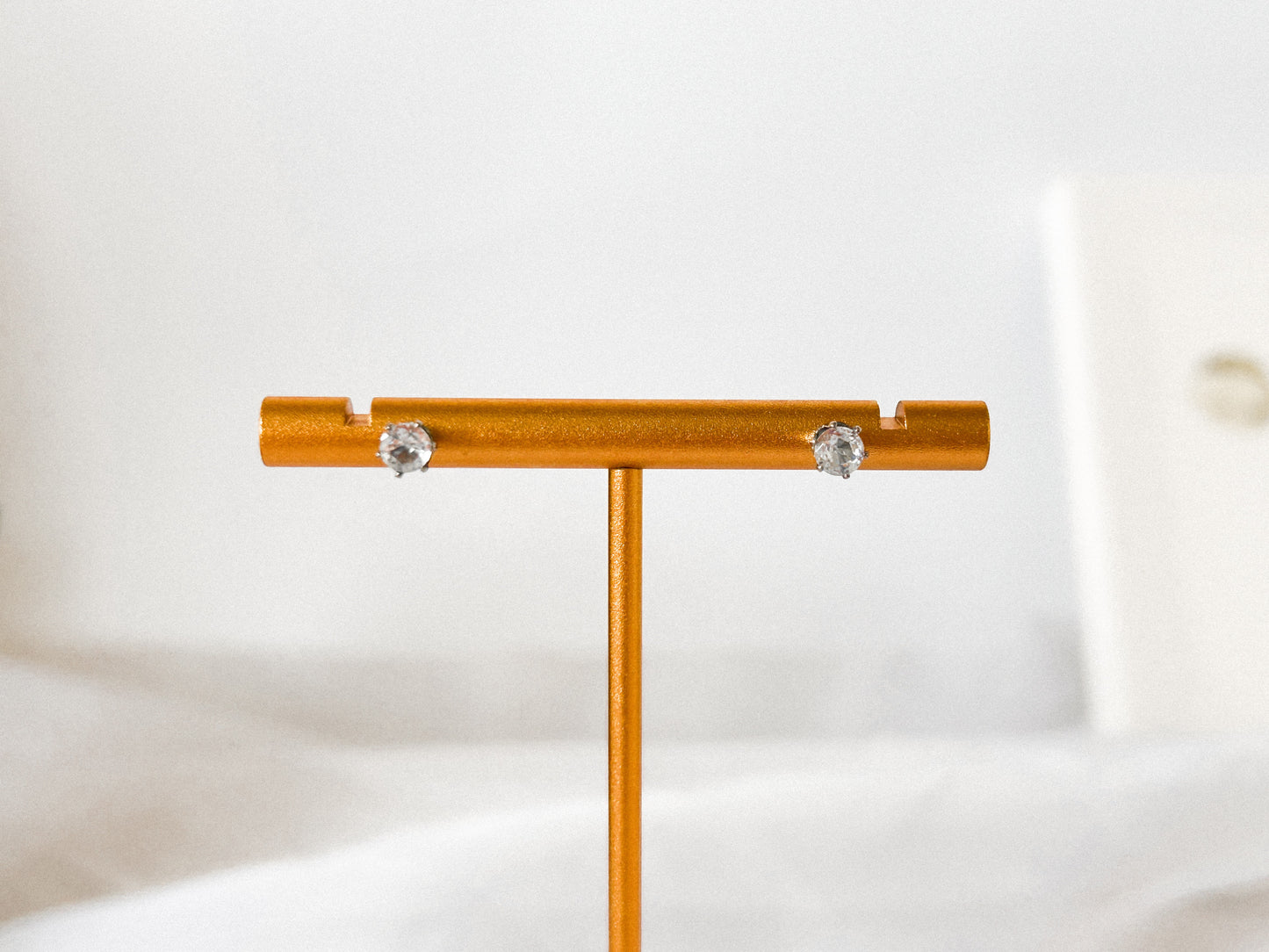 Brinco Ponto de Luz Zircônia Aço P